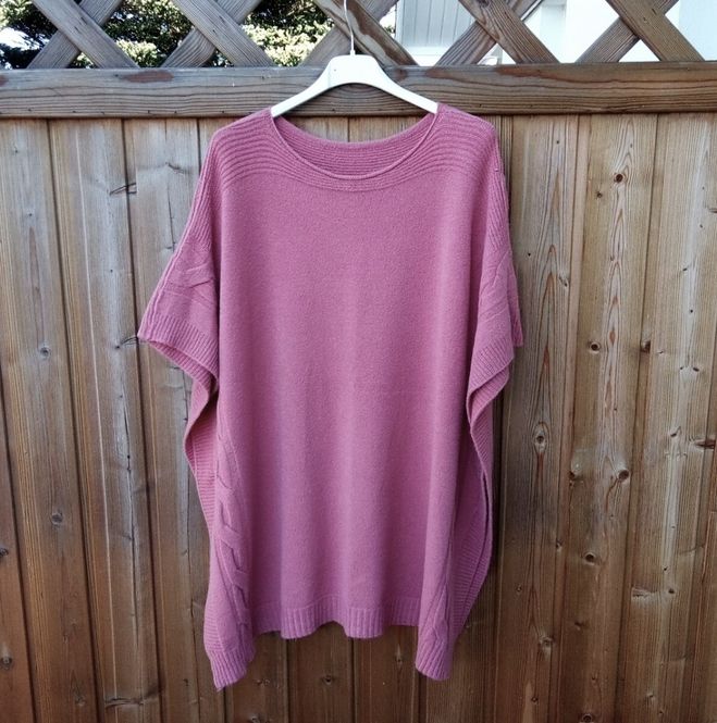 Huvudbild Rosa stickad poncho